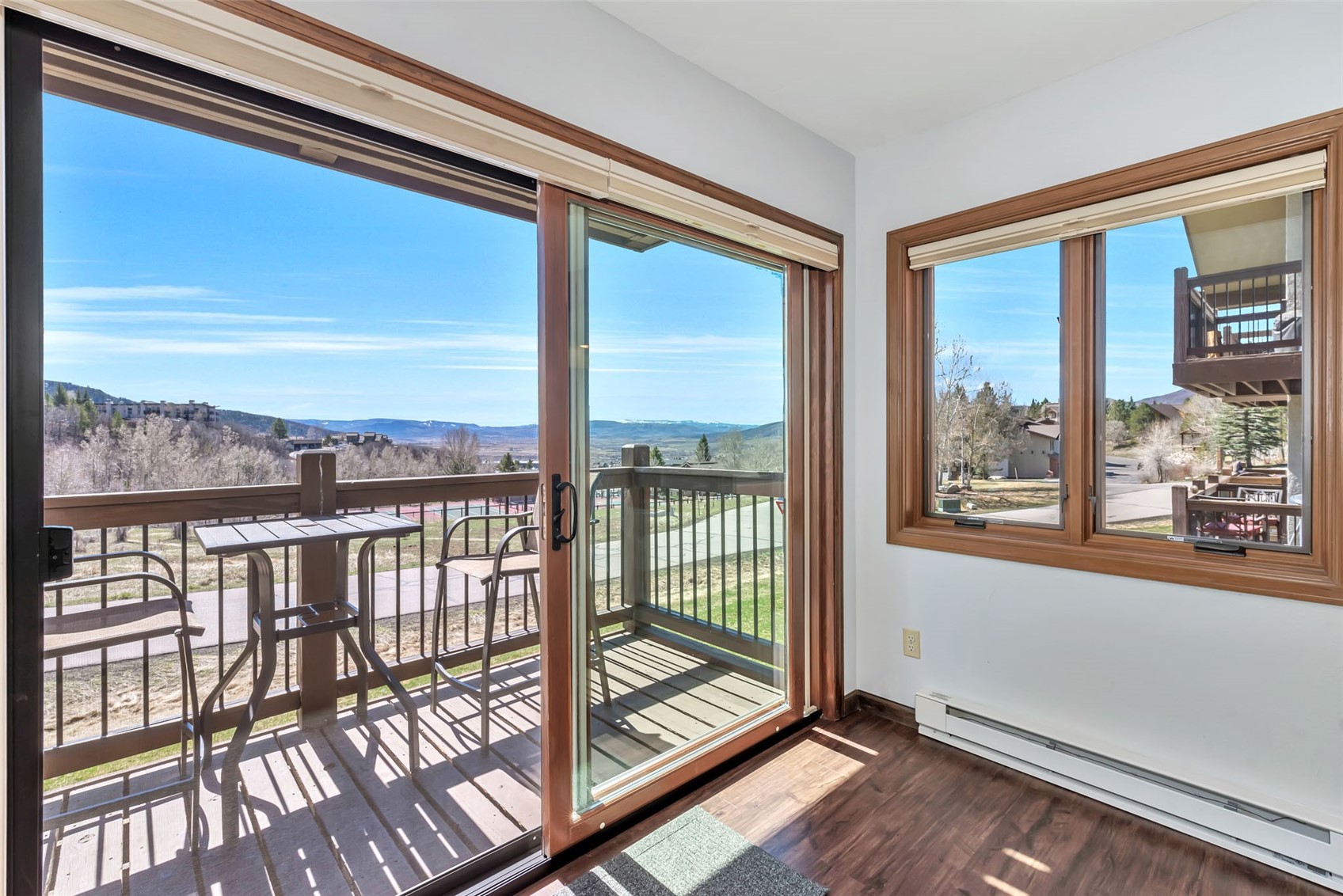 1720 Ranch Road, Unit 309 Steamboat Springs, CO 80487 - Photo 15 of 43 a view of a balcony with wooden floor