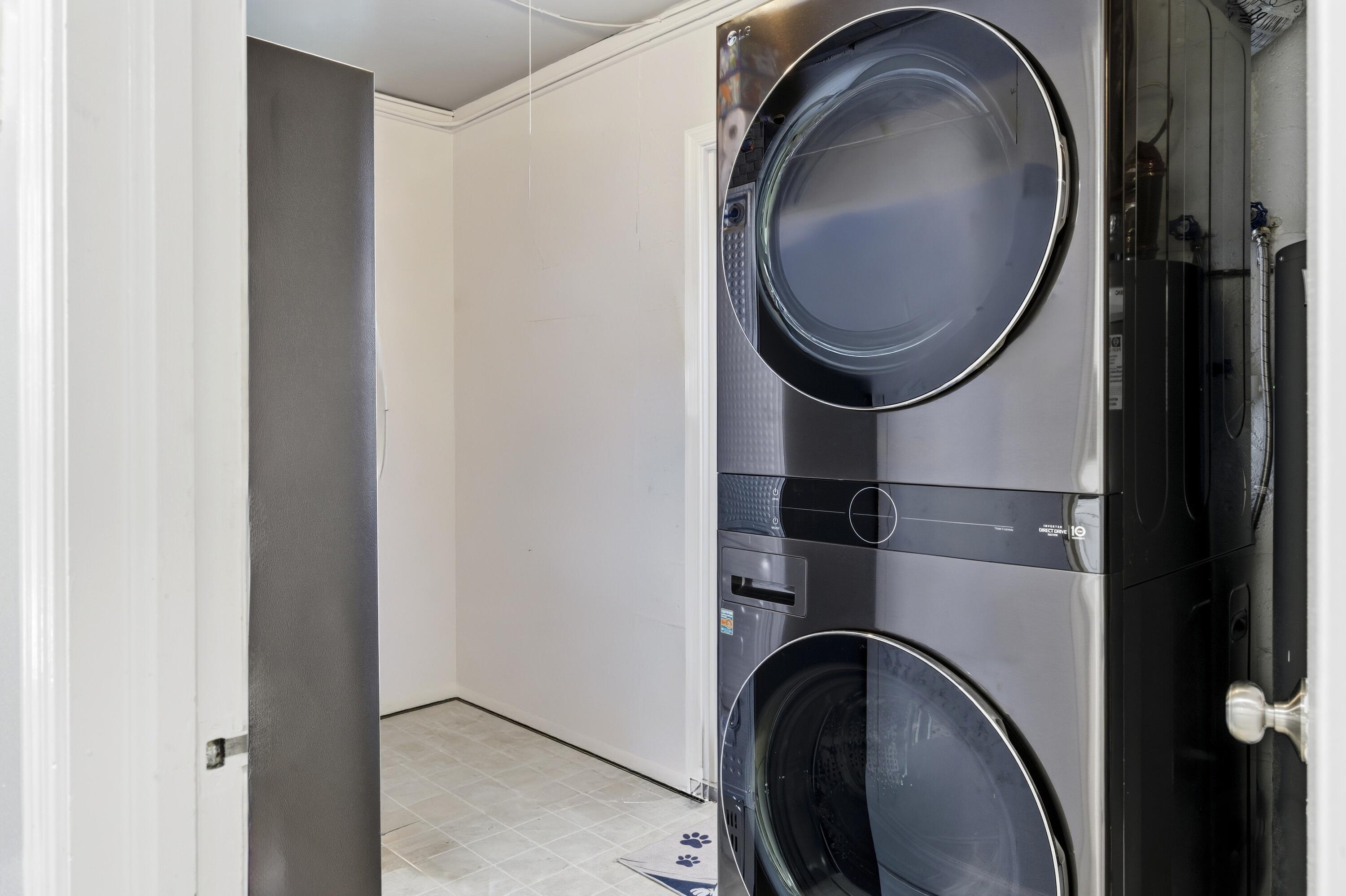 1119 North M Street Lake Worth Beach, FL 33460 - Photo 15 of 26 a close view of a utility room with dryer and washer