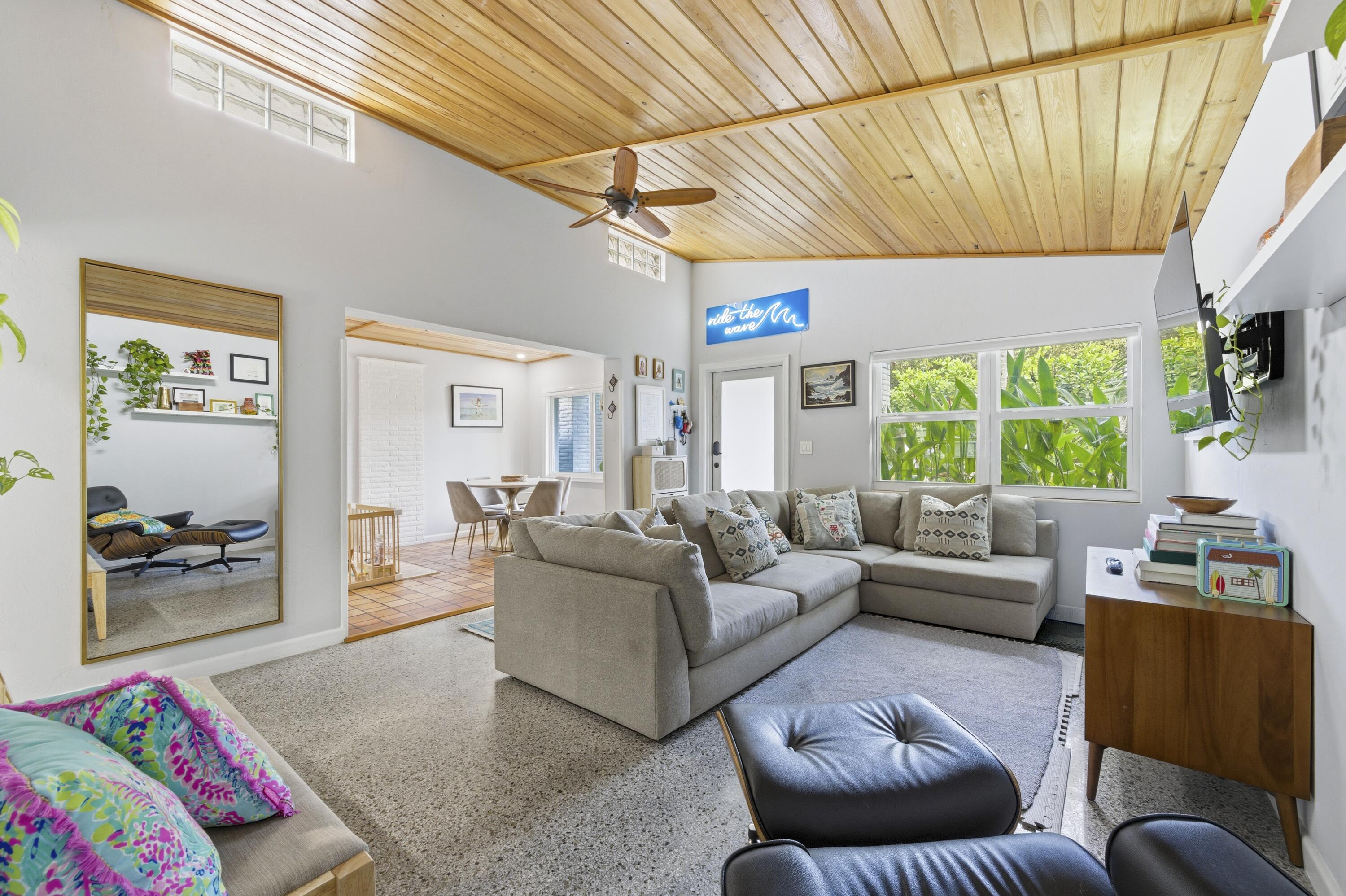 1119 North M Street Lake Worth Beach, FL 33460 - Photo 7 of 26 a living room with furniture and a large window
