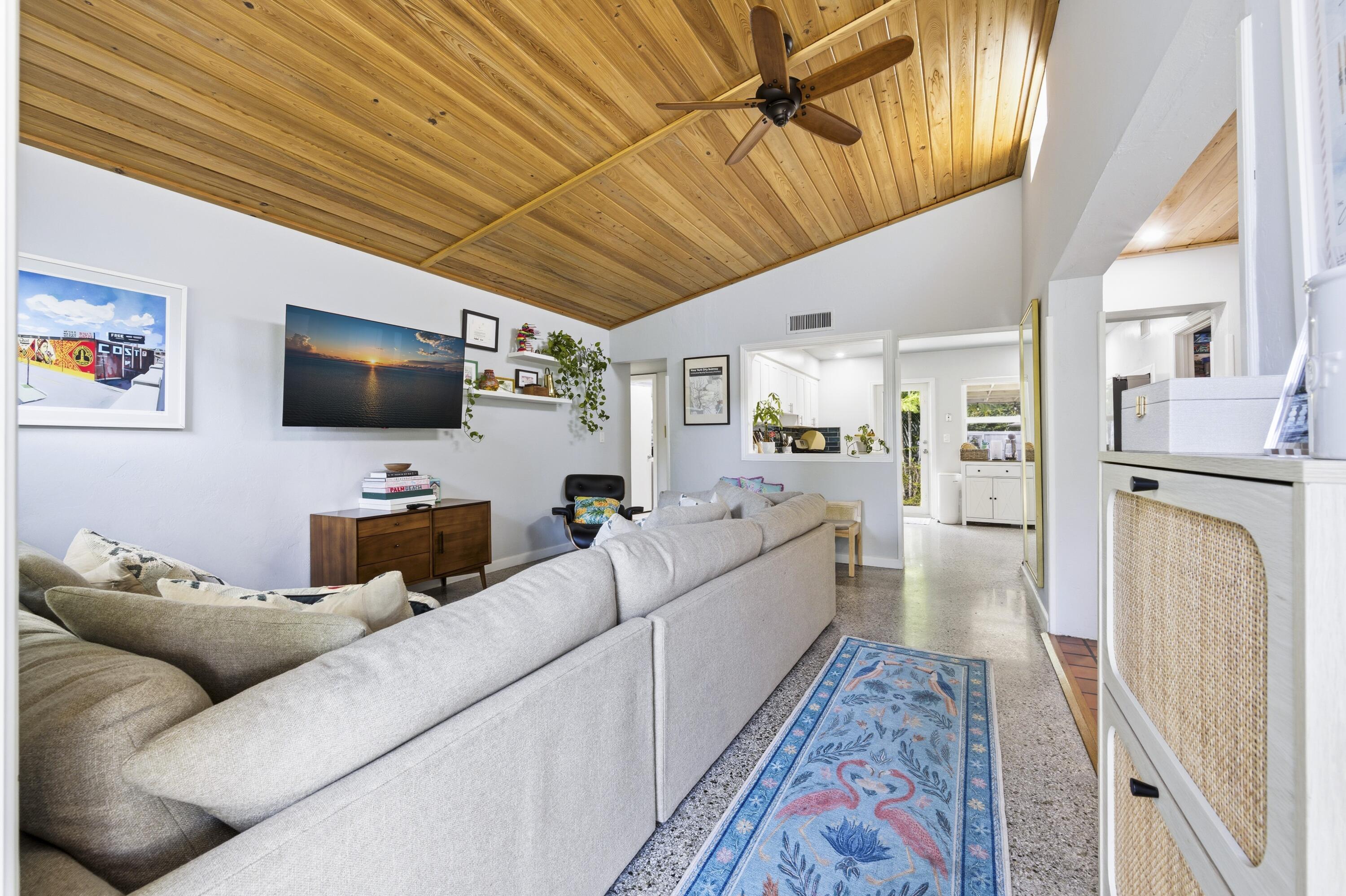 1119 North M Street Lake Worth Beach, FL 33460 - Photo 10 of 26 a living room with furniture and a flat screen tv