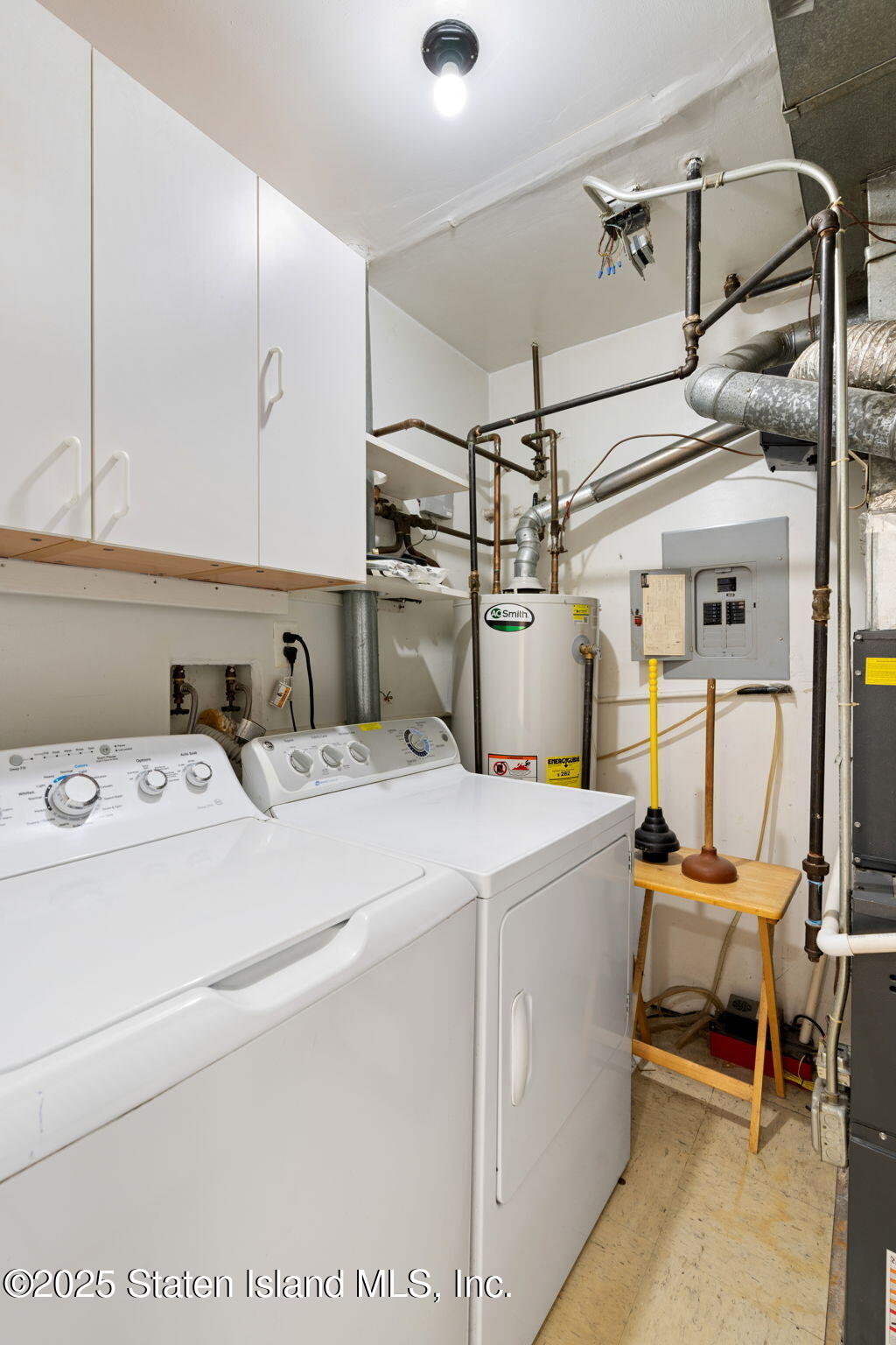 8 Dreyer Avenue, Unit A Staten Island, NY 10314 - Photo 14 of 23 a utility room with dryer and washer