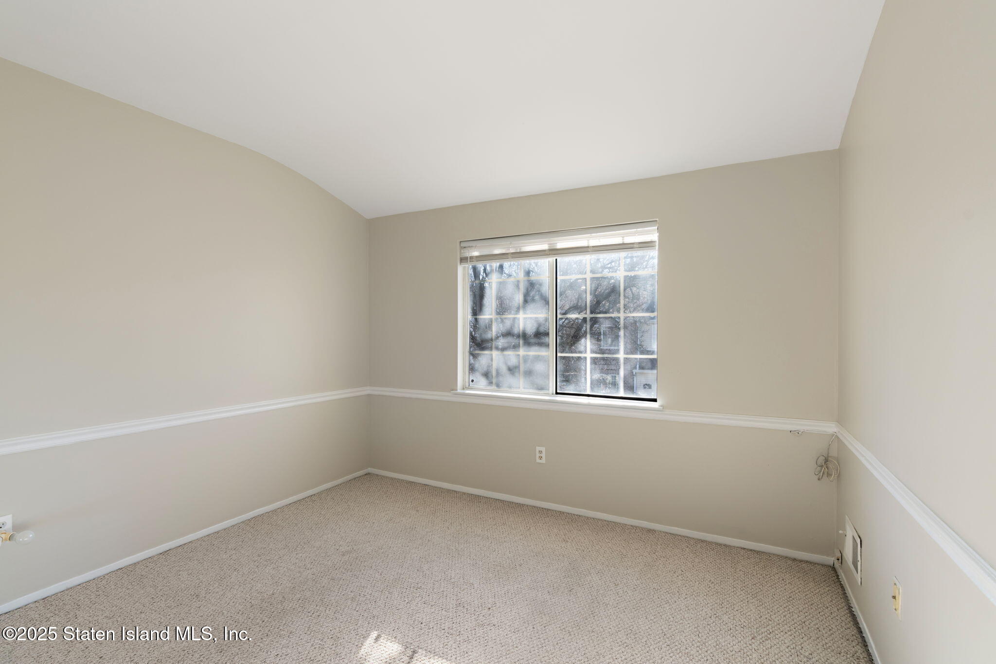 8 Dreyer Avenue, Unit A Staten Island, NY 10314 - Photo 23 of 23 an empty room with a window