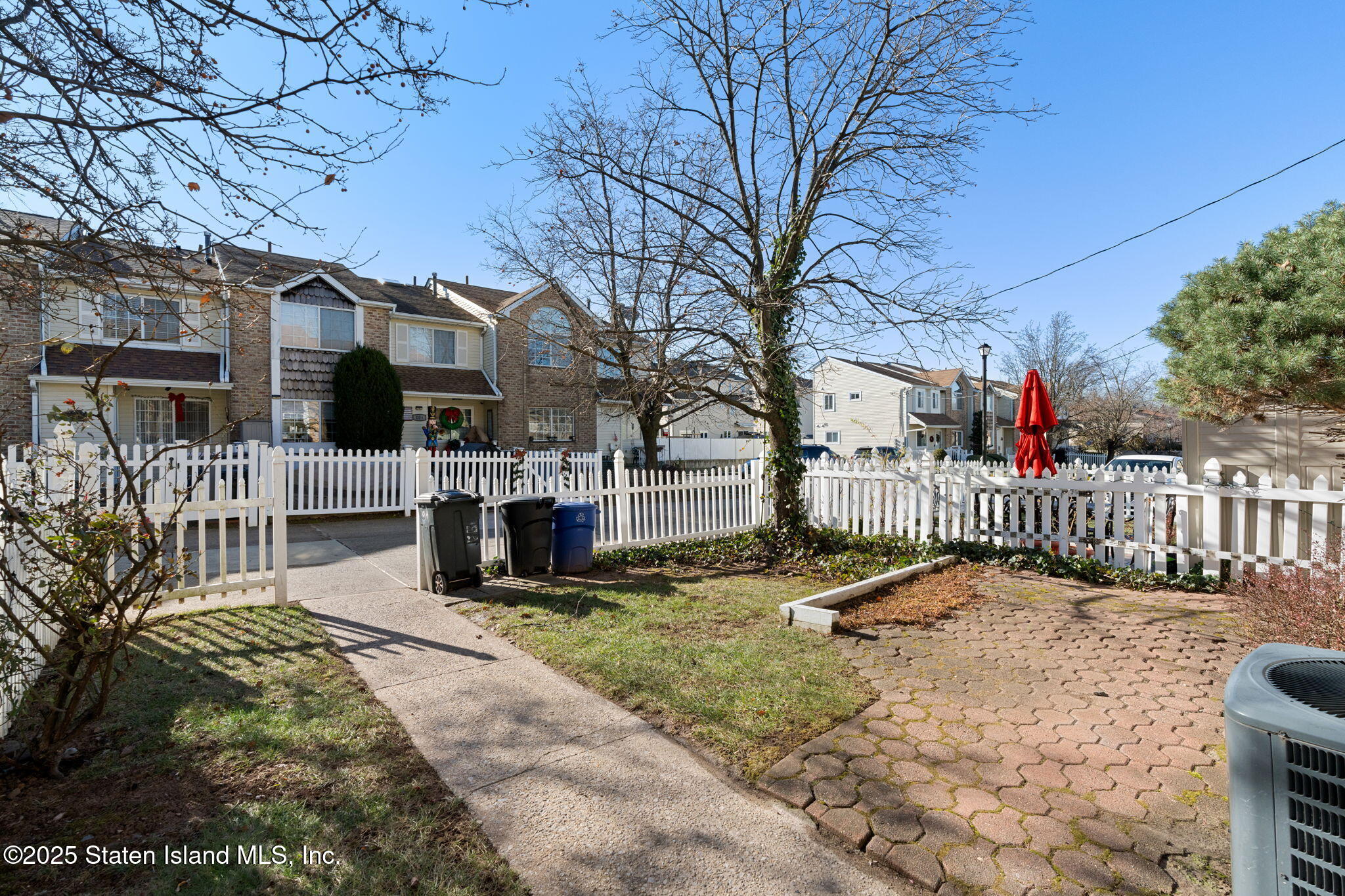 8 Dreyer Avenue, Unit A Staten Island, NY 10314 - Photo 3 of 23 a view of a house with a yard