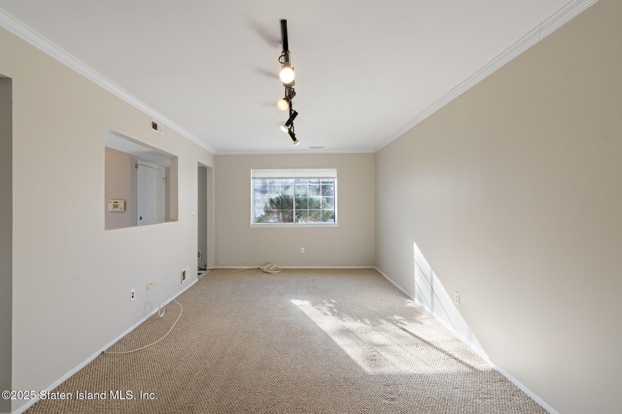 8 Dreyer Avenue, Unit A Staten Island, NY 10314 - Photo 9 of 23 a view of an empty room with a window