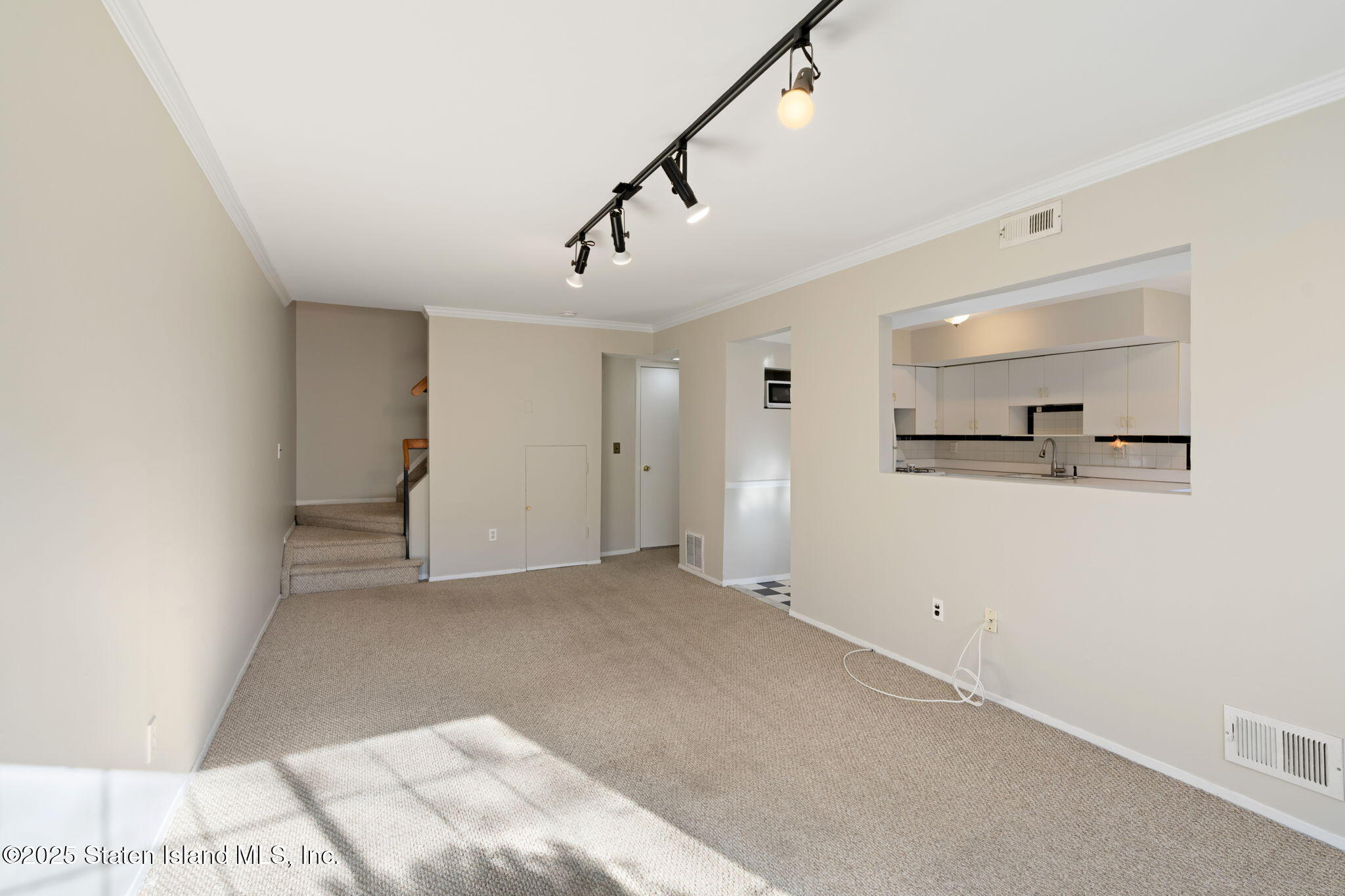 8 Dreyer Avenue, Unit A Staten Island, NY 10314 - Photo 10 of 23 a view of empty room with kitchen and window