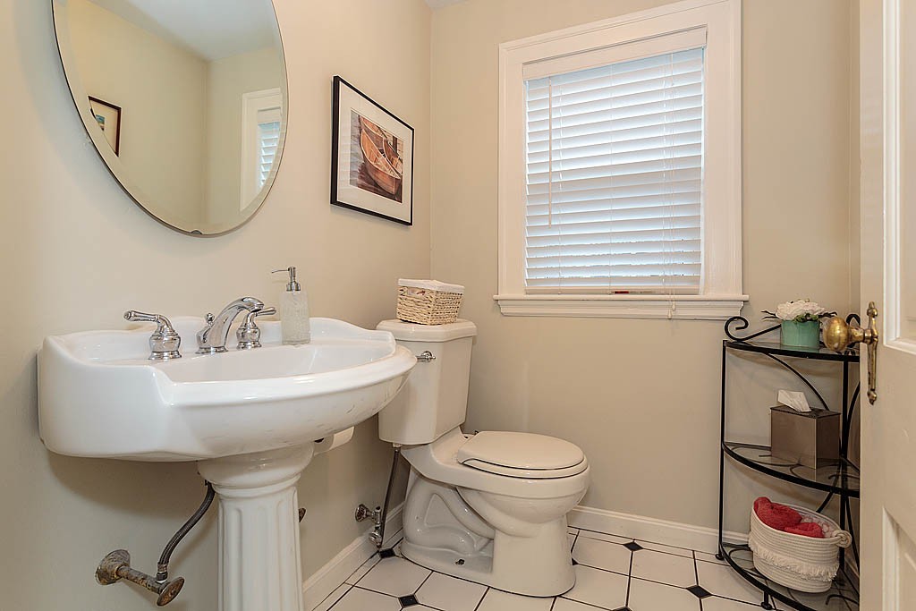 166 Lewis Road Belmont, MA 02478 - Photo 16 of 30 a bathroom with a sink toilet and a mirror