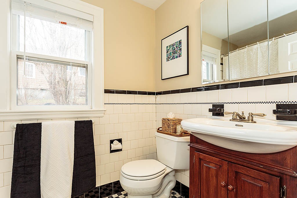 166 Lewis Road Belmont, MA 02478 - Photo 21 of 30 a bathroom with a sink a toilet and mirror