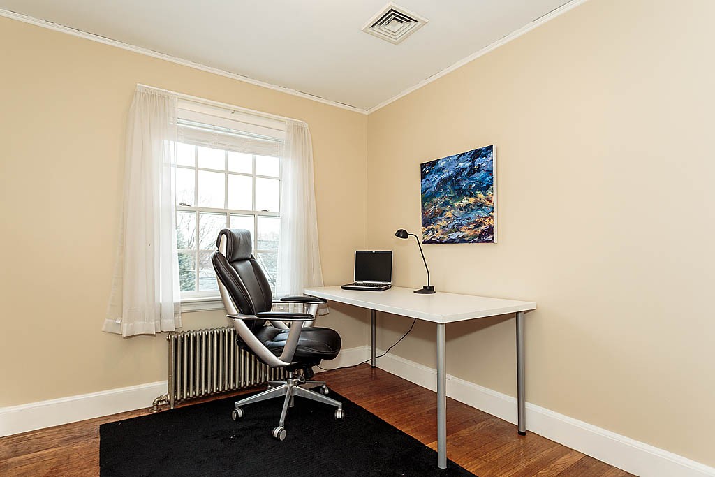 166 Lewis Road Belmont, MA 02478 - Photo 24 of 30 a view of a workspace with furniture and a window