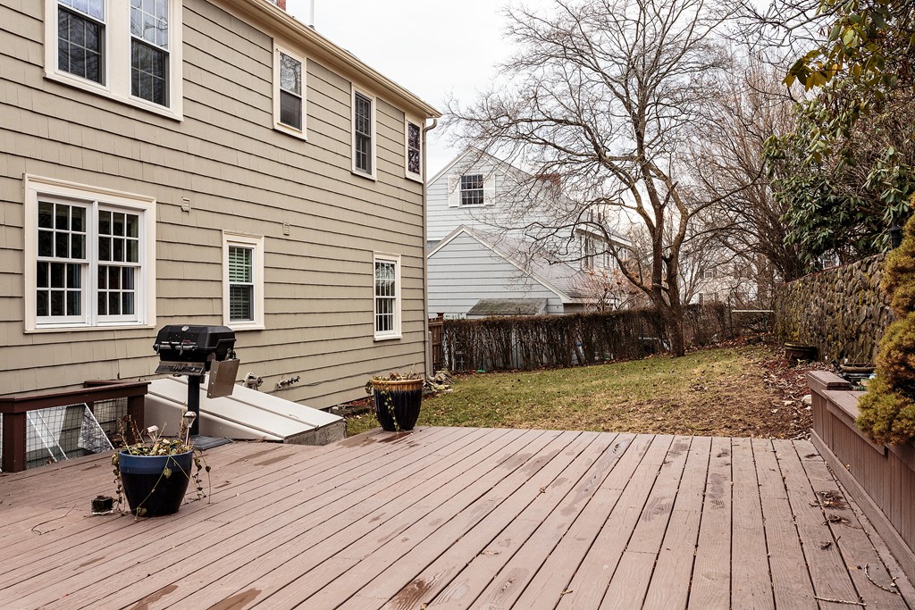 166 Lewis Road Belmont, MA 02478 - Photo 30 of 30 a view of a deck with chairs and wooden floor