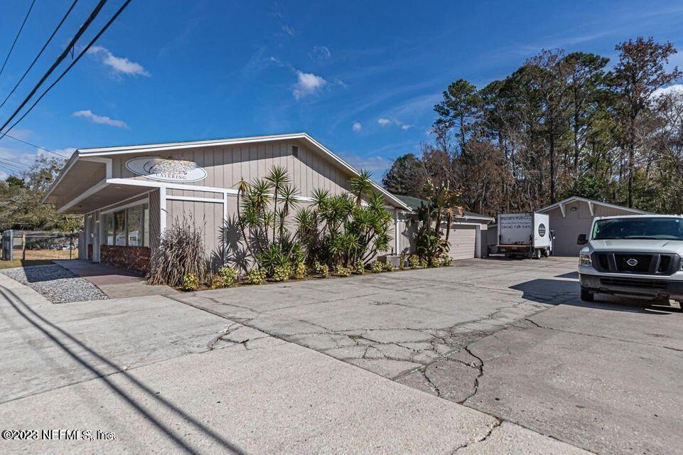 3305 Parental Home Road Jacksonville, FL 32216 - Photo 1 of 26 SIDE VIEW
