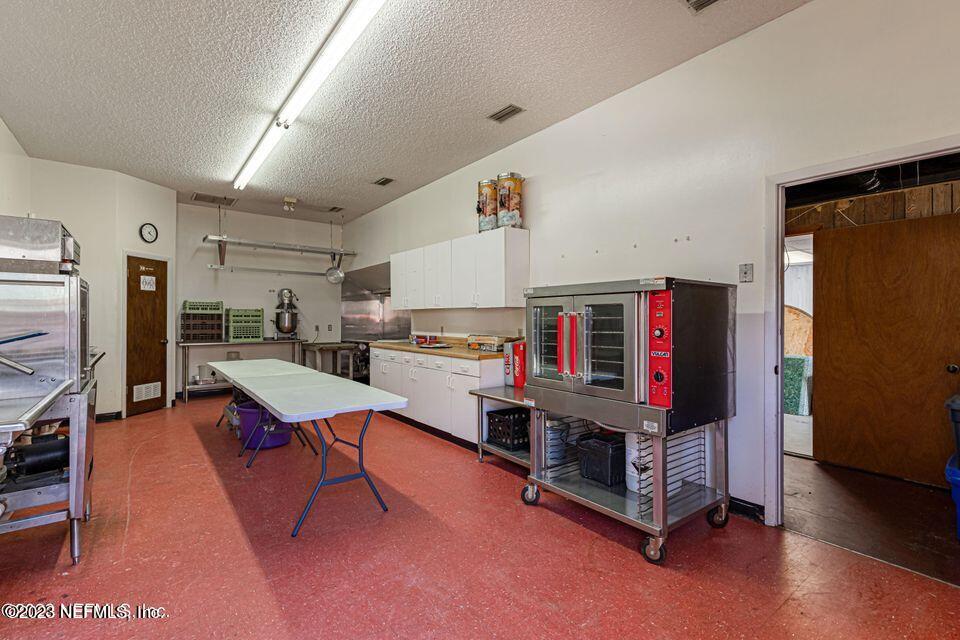 3305 Parental Home Road Jacksonville, FL 32216 - Photo 10 of 26 KITCHEN 3 & PREP ROOM