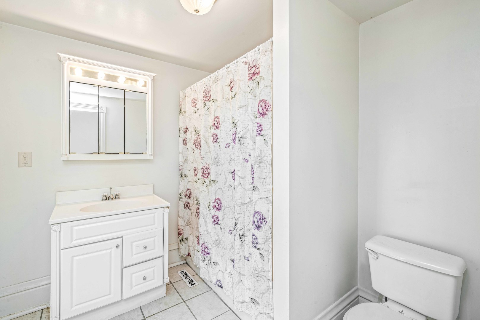 2785 Perry Road Steward, IL 60553 - Photo 15 of 22 a bathroom with a sink toilet and shower