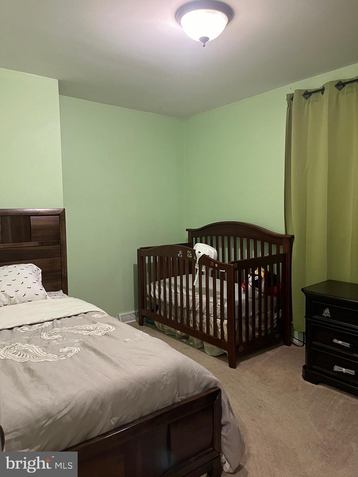 1006 Susan Road Philadelphia, PA 19115 - Photo 25 of 37 a bedroom with a bed and a window