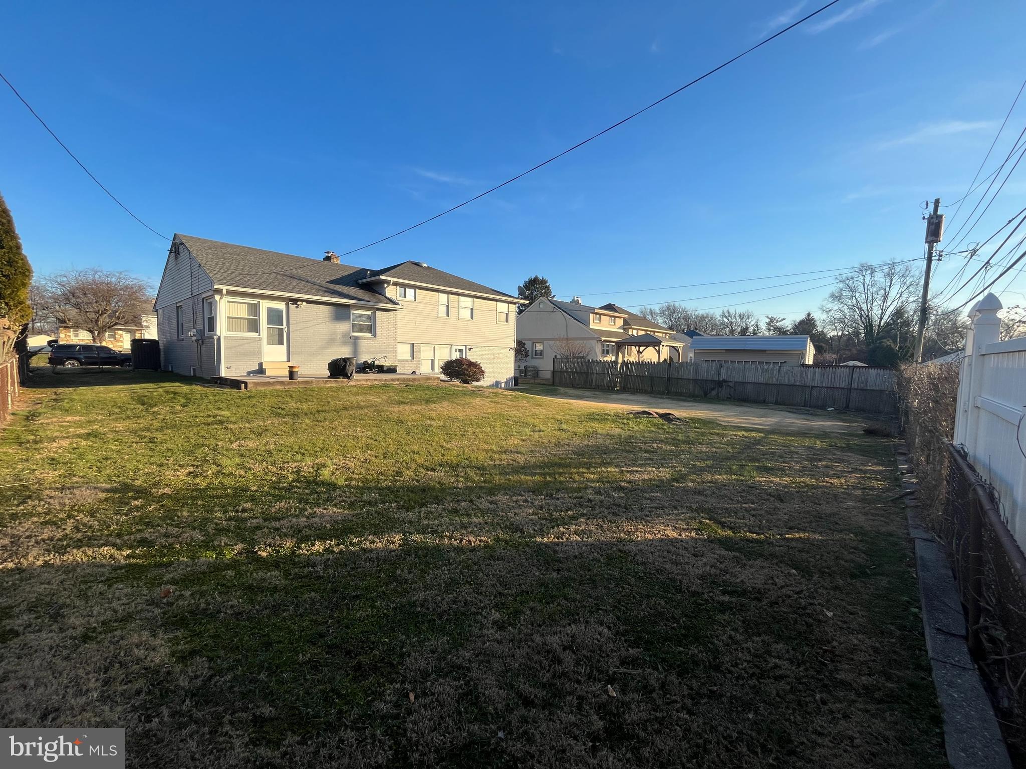 1006 Susan Road Philadelphia, PA 19115 - Photo 31 of 37 a view of a house with a big yard and large trees