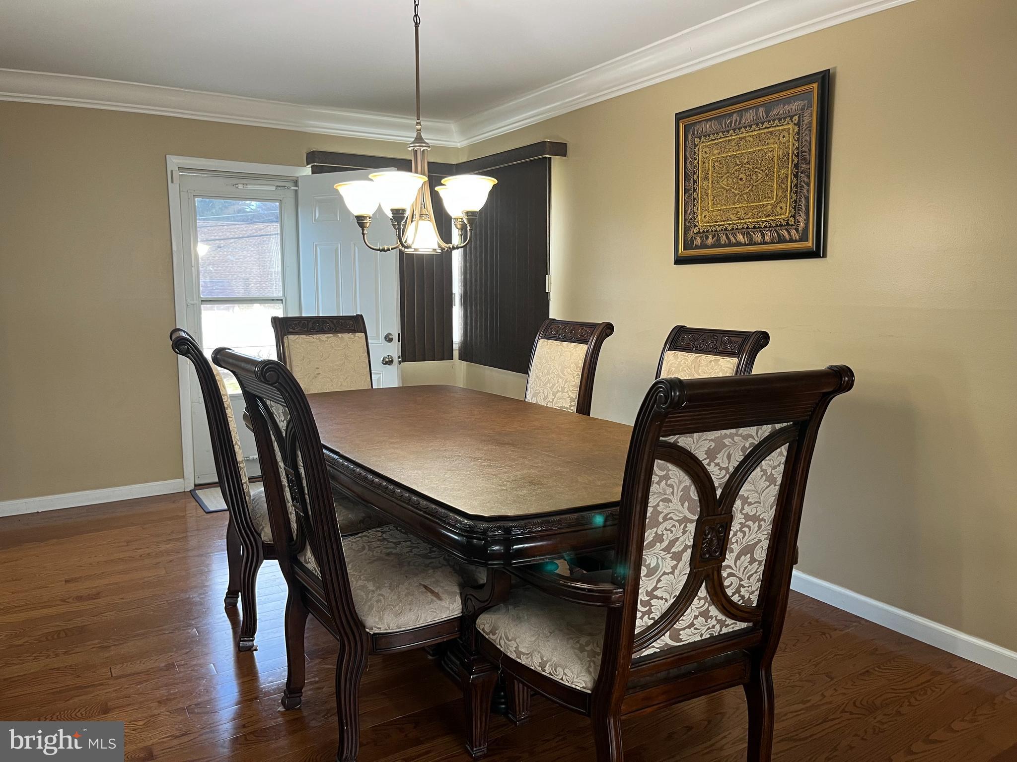 1006 Susan Road Philadelphia, PA 19115 - Photo 9 of 37 a view of a dining room with furniture window and wooden floor
