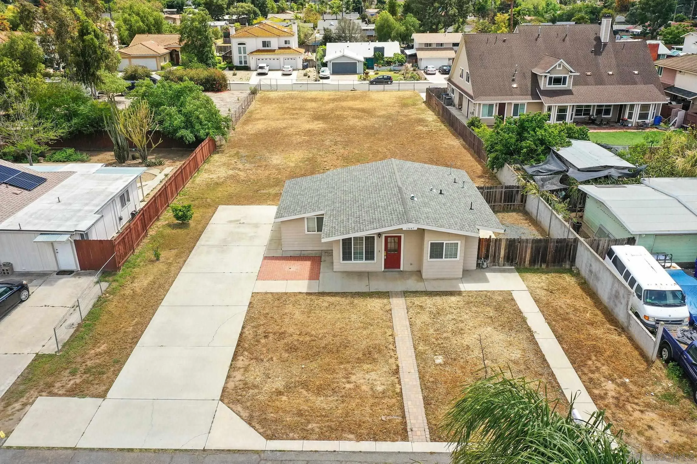13647 Somerset Road Poway, CA 92064 - Photo 1 of 25 an aerial view of a house with swimming pool