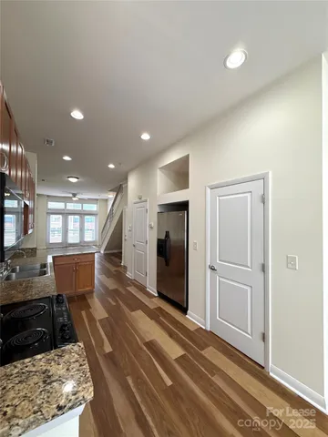 a view of a living room and dining room
