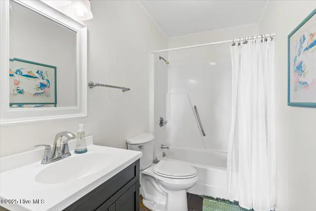 $1,599,000 | 877 Ocean Boulevard West, Holden Beach, NC 28462