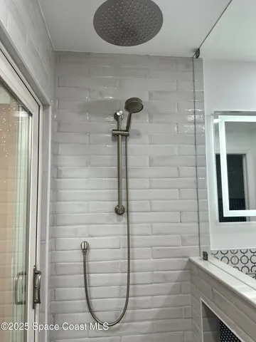 a view of a livingroom with furniture and a window