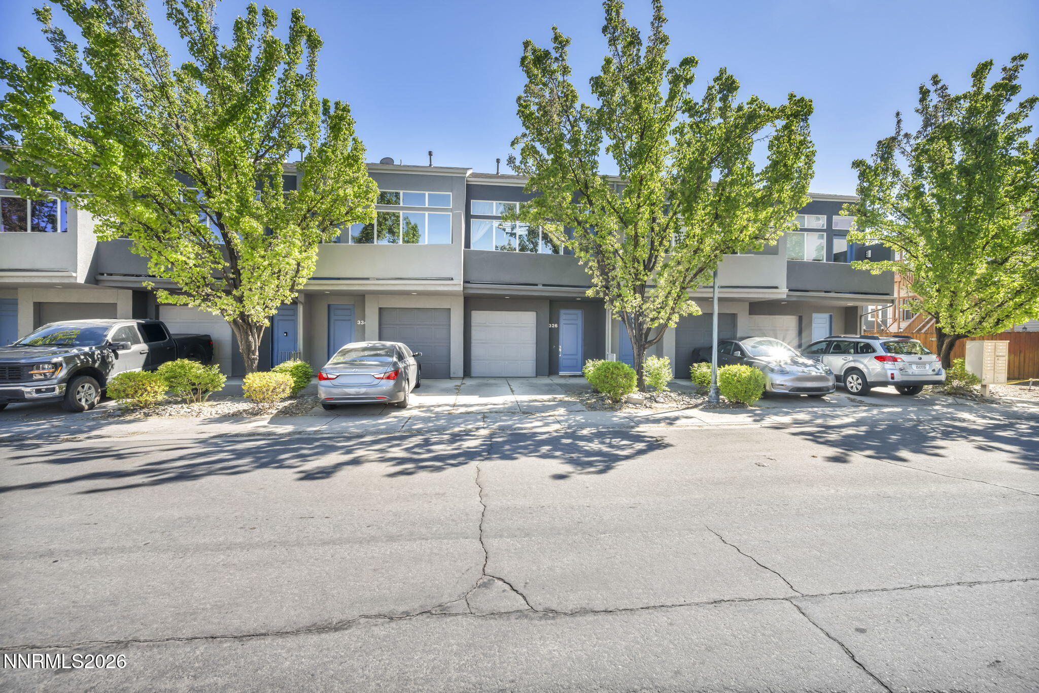 326 State Street Reno, NV 89501 - Photo 5 of 49 a front view of a house with a yard and garage