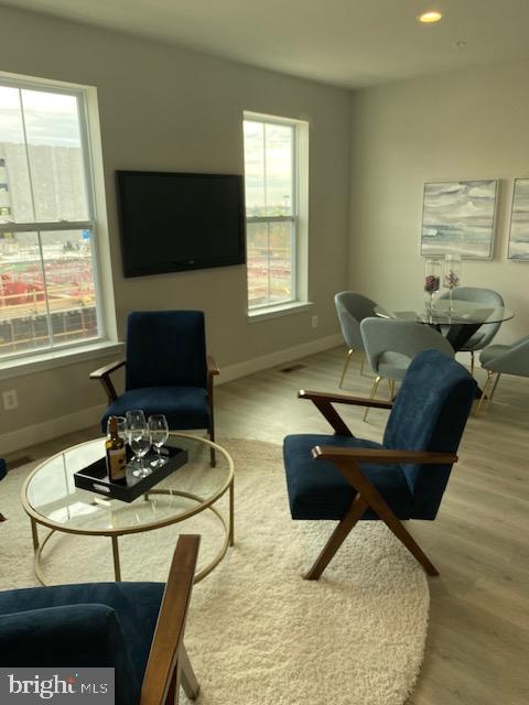 1951 Roland Clarke Place, Unit 31 Reston, VA 20191 - Photo 9 of 12 FAMILY ROOM