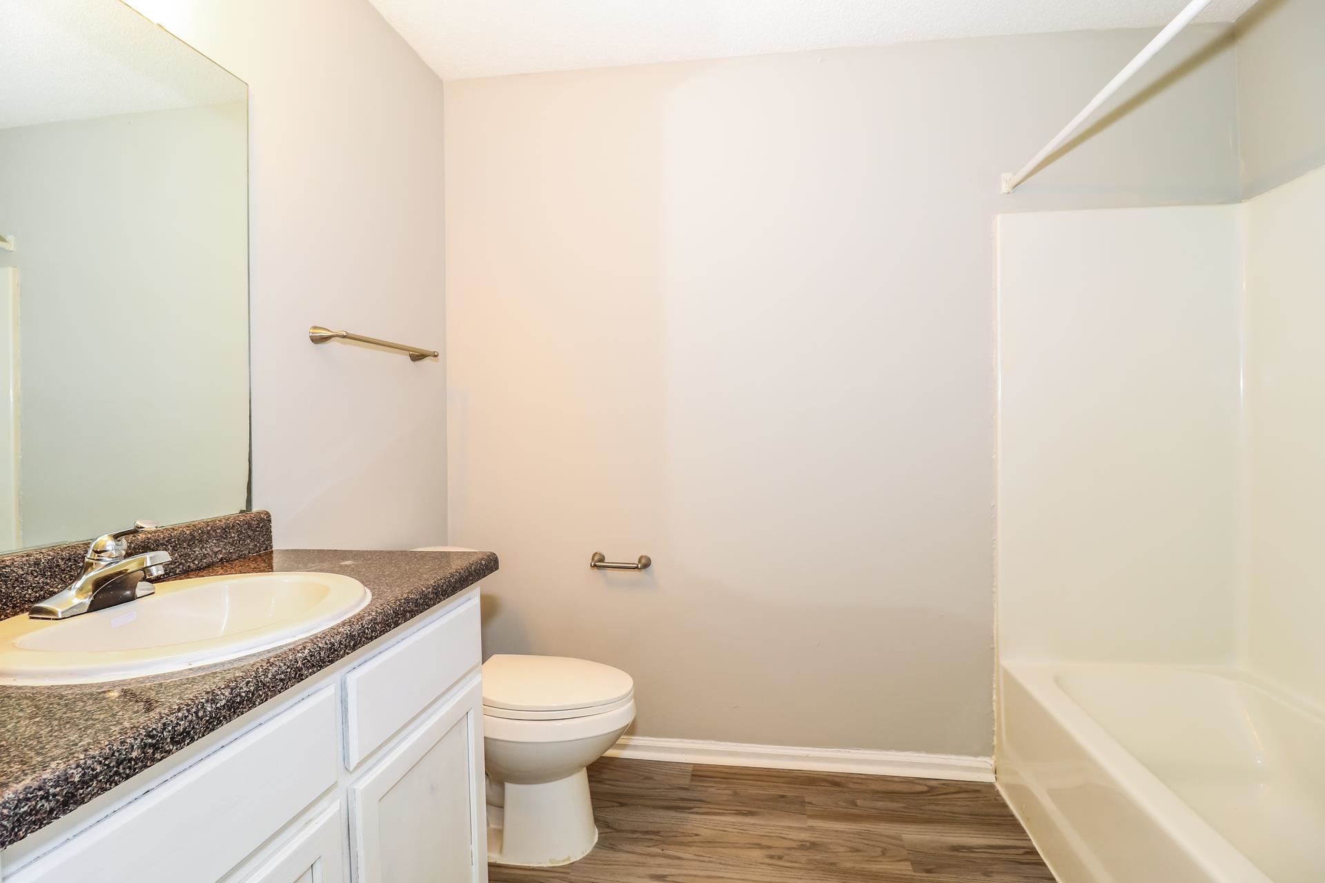 2415 North Forest Hill Irene Road Cordova, TN 38016 - Photo 13 of 16 Full bath featuring vanity, dark wood-type flooring, and shower / bathtub combination