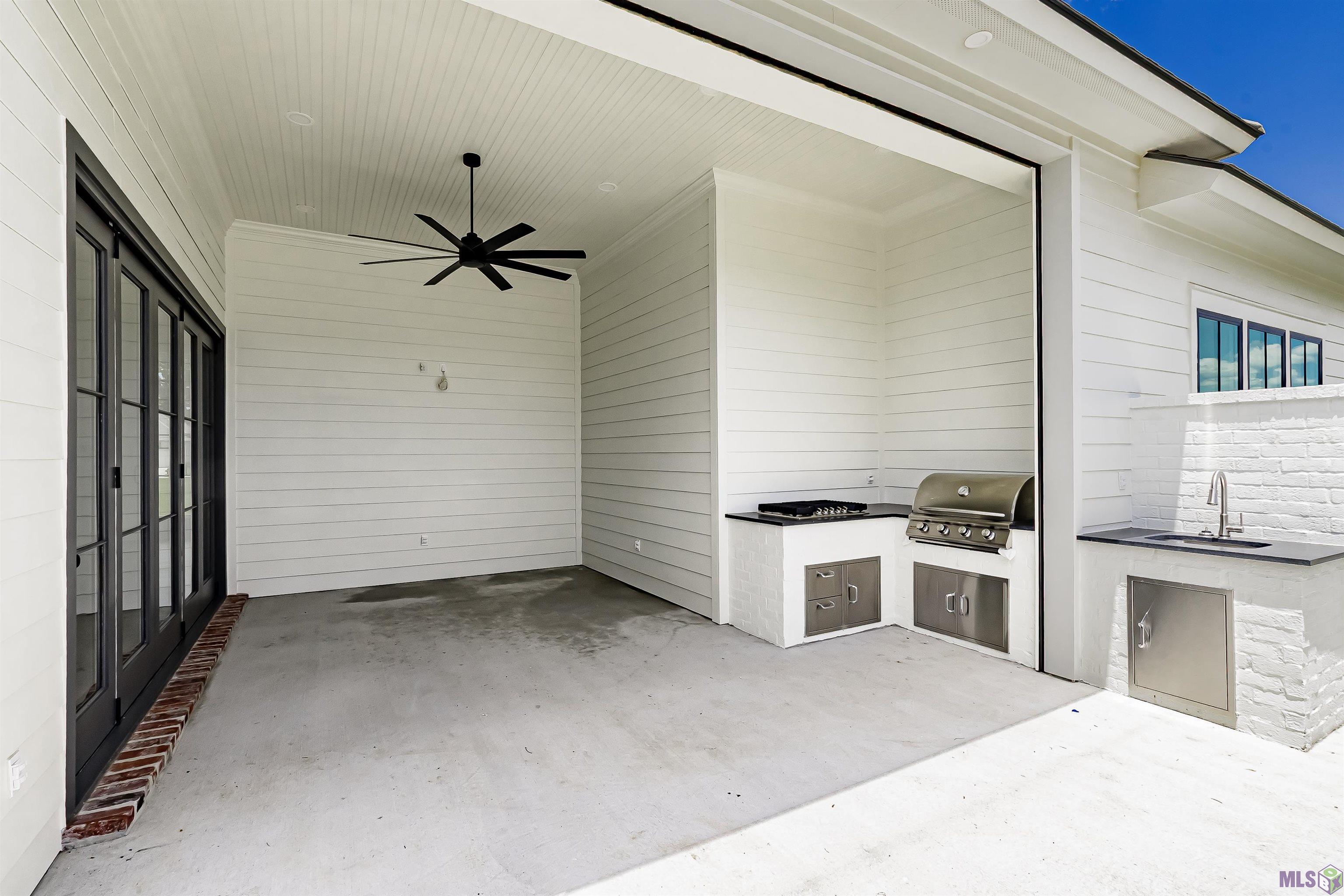 15725 Jack Street Baton Rouge, LA 70817 - Photo 52 of 54 Patio with Remote Screen