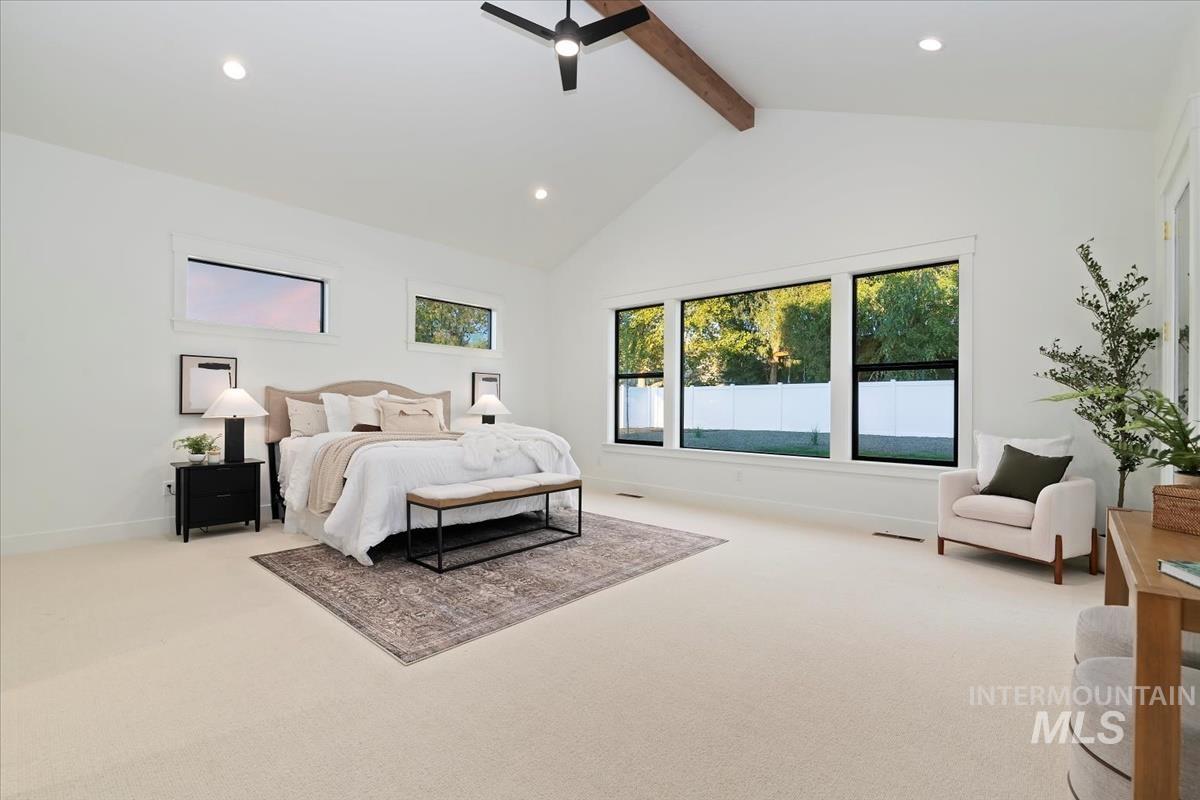 196 North Timber Wolf Place Eagle, ID 83616 - Photo 21 of 50 Bedroom with beam ceiling, carpet floors, recessed lighting, multiple windows, and ceiling fan