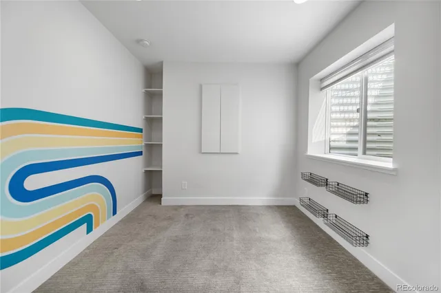 a view of walk in closet with window