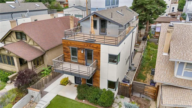 an aerial view of a house with a garden