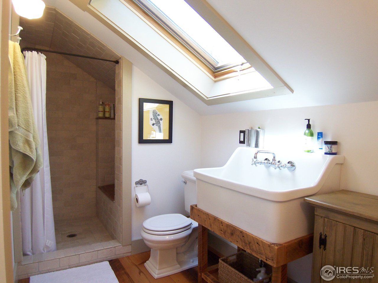 459 Gold Run Road Boulder, CO 80302 - Photo 13 of 18 a bathroom with a sink toilet and shower