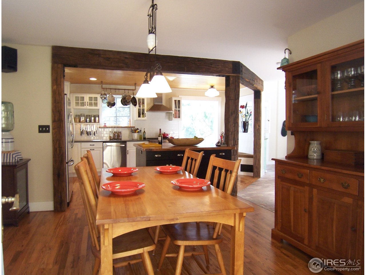 459 Gold Run Road Boulder, CO 80302 - Photo 7 of 18 a view of a dining room with furniture and wooden floor