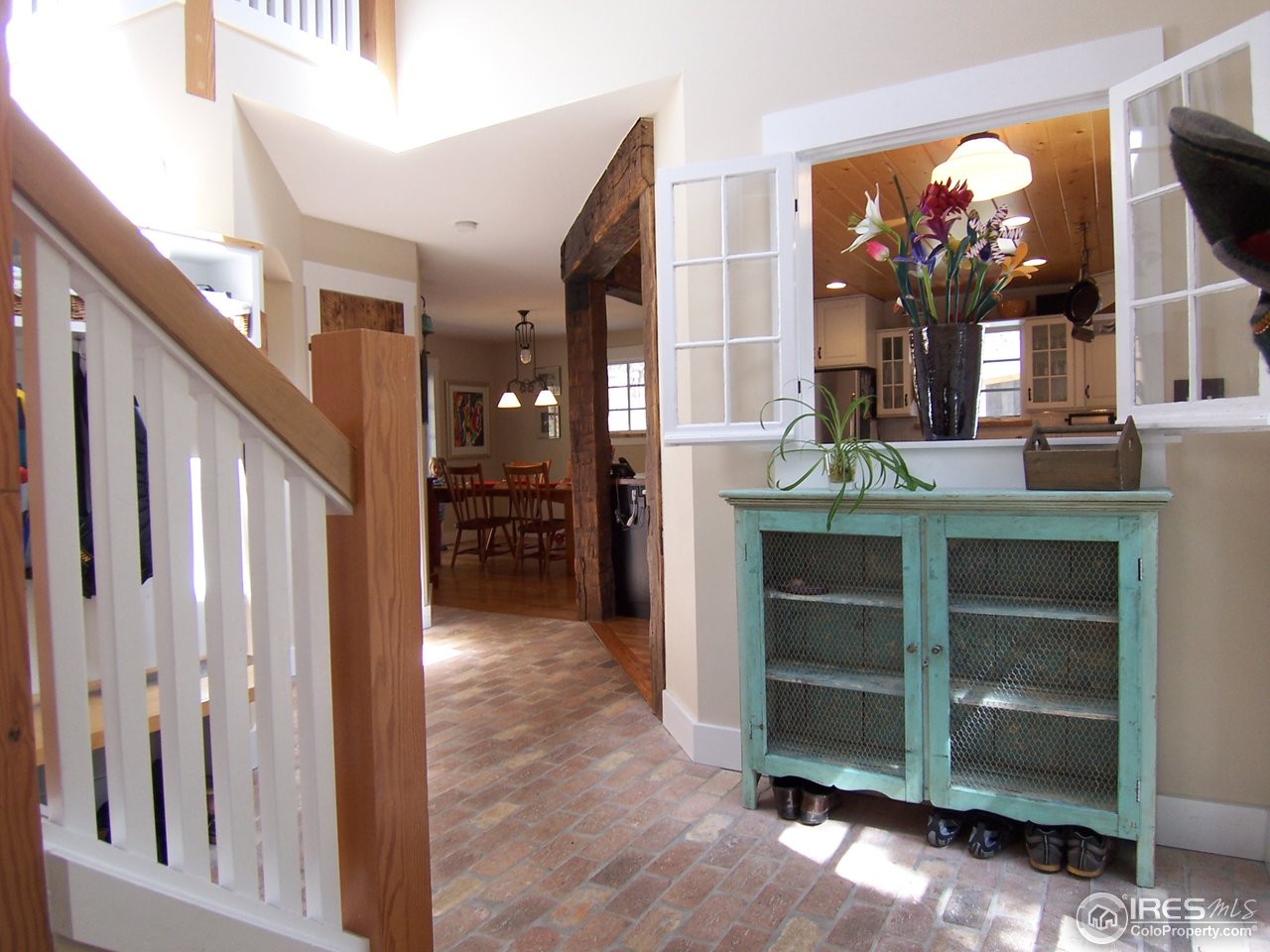 459 Gold Run Road Boulder, CO 80302 - Photo 9 of 18 a view of living room kitchen and entryway