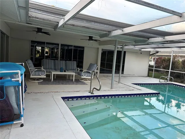 a room with lots of table and chairs