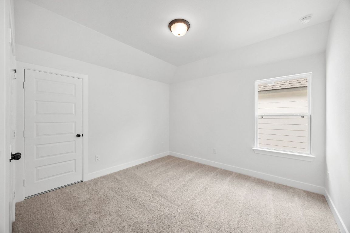 617 Buckaroo Drive Georgetown, TX 78633 - Photo 21 of 33 an empty room with windows