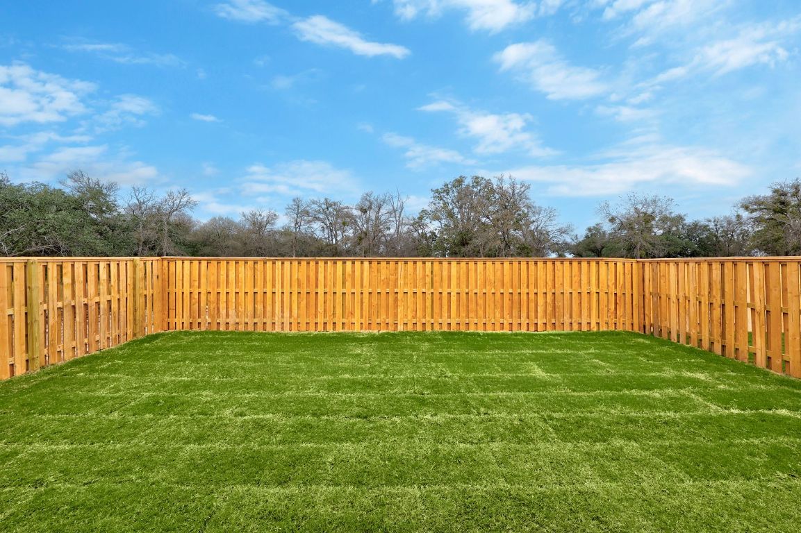 617 Buckaroo Drive Georgetown, TX 78633 - Photo 26 of 33 a view of a yard with an outdoor space