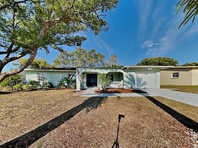 a view of a house with a patio