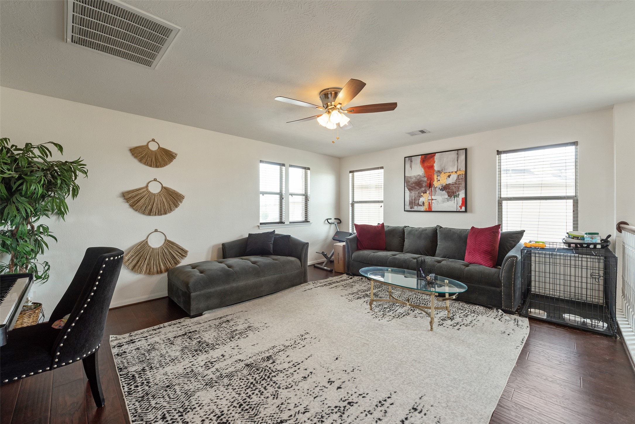 3554 Bennett Trails Drive Spring, TX 77386 - Photo 24 of 44 a living room with furniture a chandelier and a window