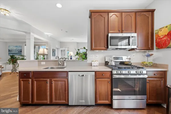 a kitchen with a stove and a microwave