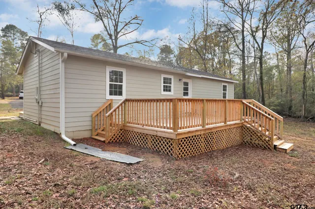 a view of a porch with a yard