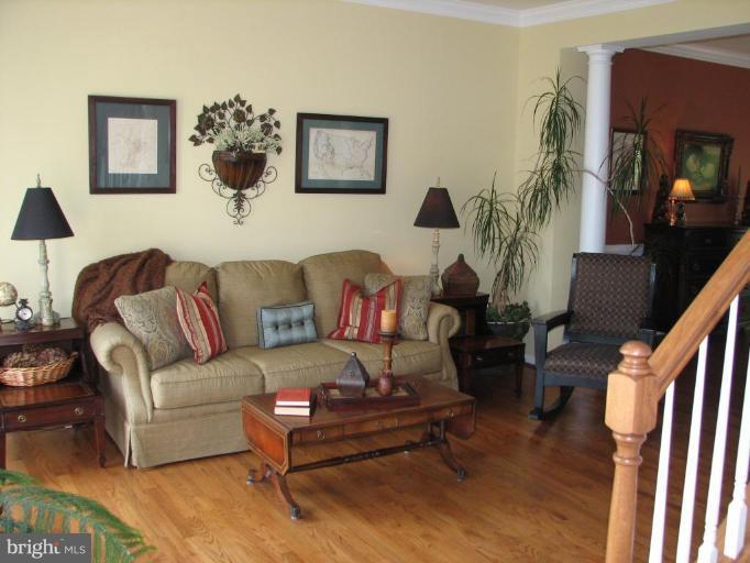 5910 Sunlight Mountain Road Spotsylvania, VA 22553 - Photo 12 of 30 a living room with furniture and a flat screen tv