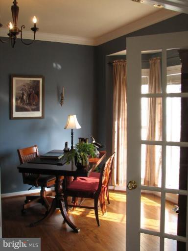 5910 Sunlight Mountain Road Spotsylvania, VA 22553 - Photo 20 of 30 a view of a workspace with furniture and a window