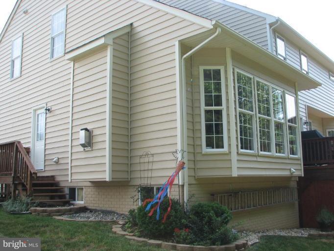 5910 Sunlight Mountain Road Spotsylvania, VA 22553 - Photo 3 of 30 a front view of a house with a yard