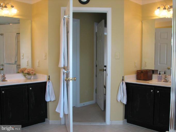5910 Sunlight Mountain Road Spotsylvania, VA 22553 - Photo 26 of 30 a bathroom with a sink and a mirror