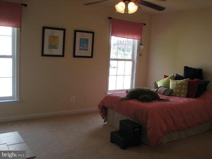 5910 Sunlight Mountain Road Spotsylvania, VA 22553 - Photo 28 of 30 a bedroom with a bed and window