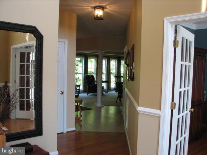 5910 Sunlight Mountain Road Spotsylvania, VA 22553 - Photo 9 of 30 a view of a hallway of a livingroom
