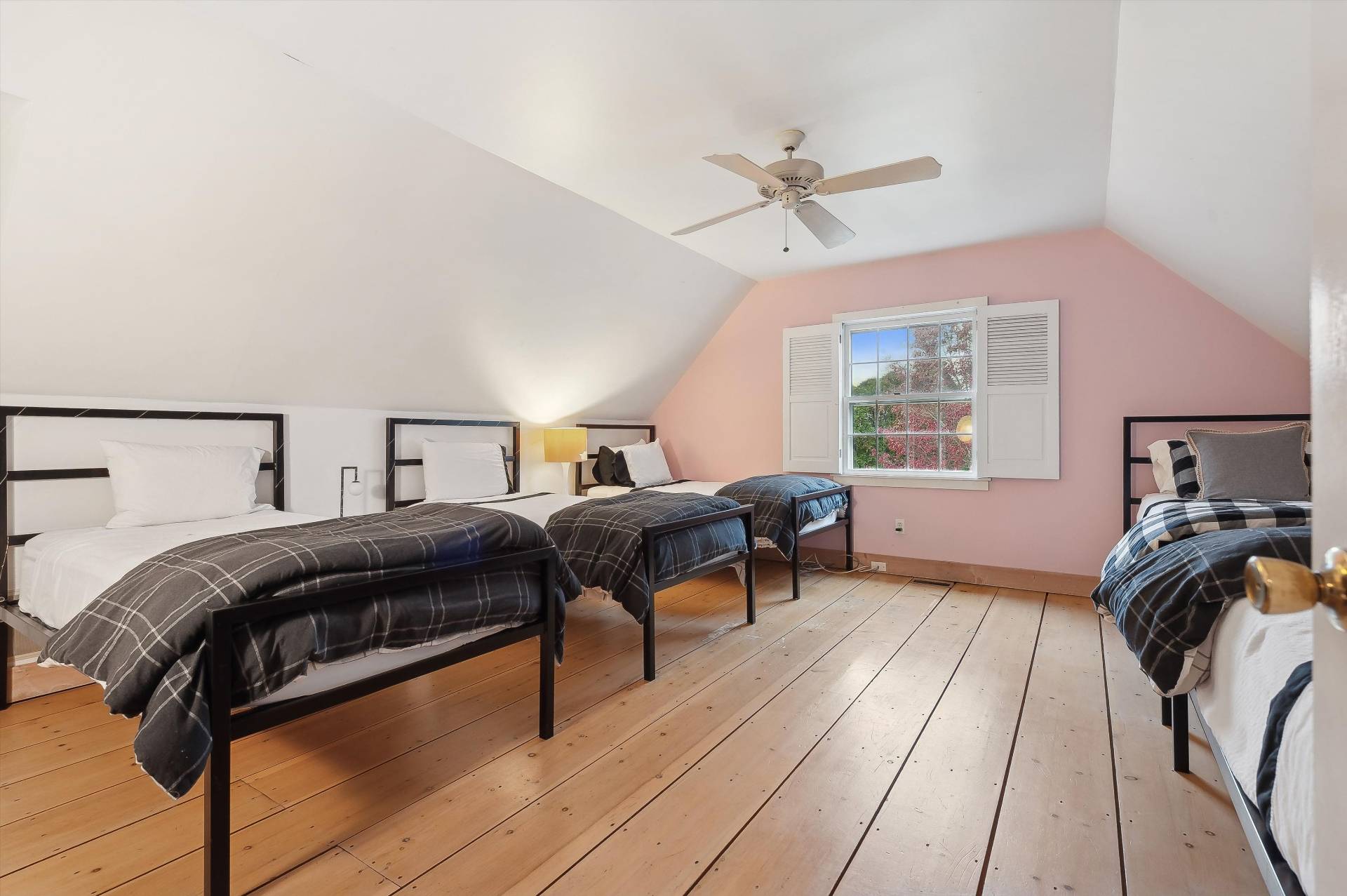 356 7 Ponds Towd Road Water Mill, NY 11976 - Photo 21 of 22 a bedroom with a bed and wooden floor