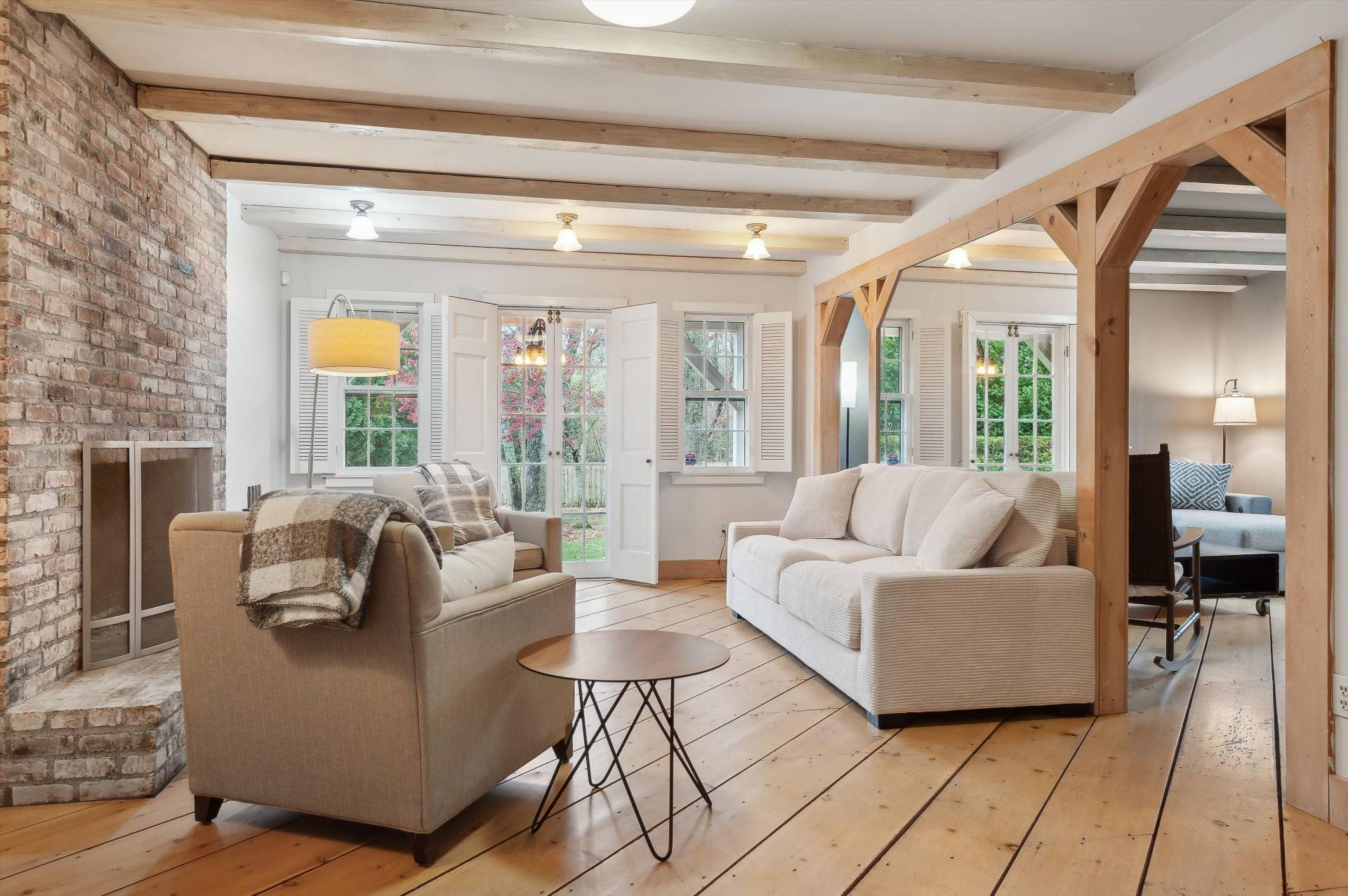 356 7 Ponds Towd Road Water Mill, NY 11976 - Photo 8 of 22 a living room with furniture and a large window