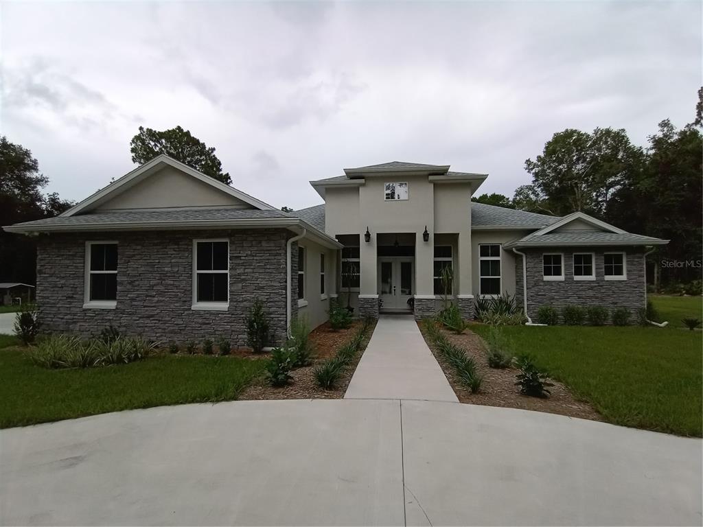 5854 Northeast 43rd Lane Road Silver Springs, FL 34488 - Photo 1 of 1 5854 NE 43rd Lane Road