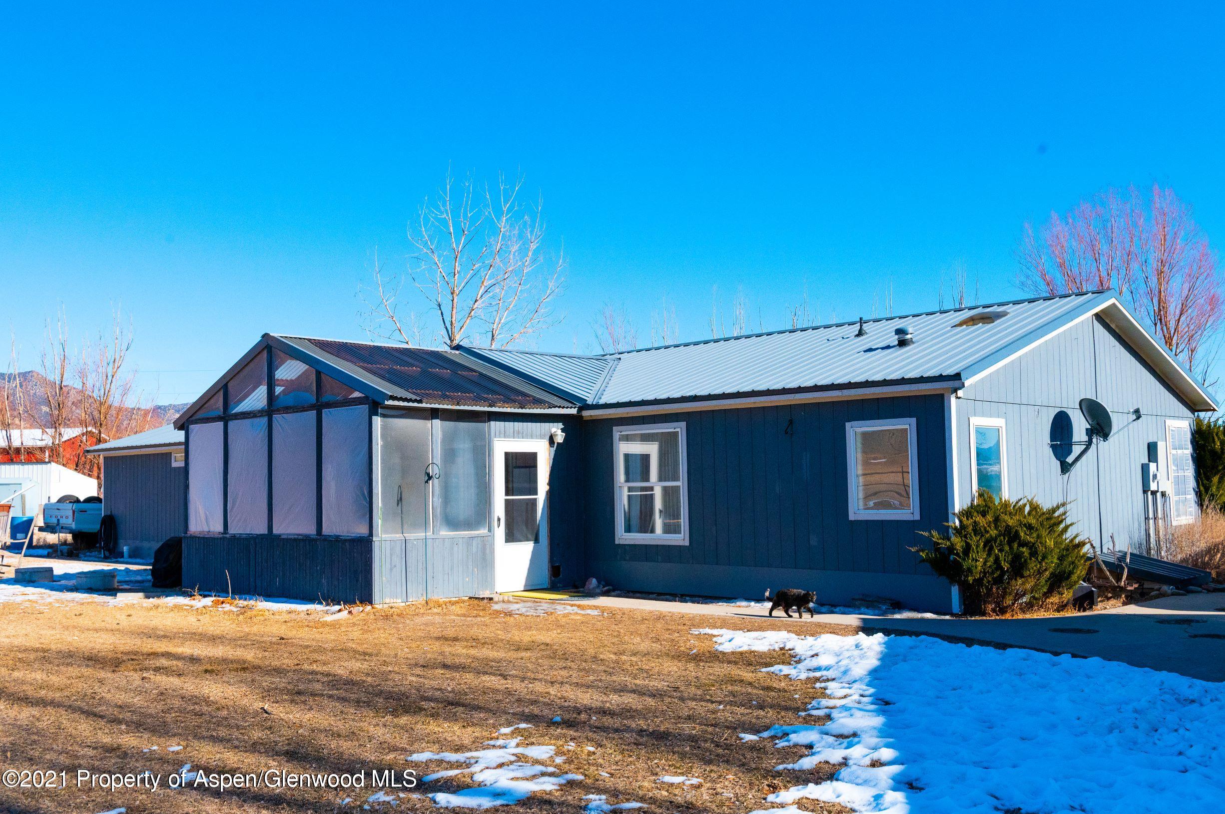 3171 County Road 233 Rifle, CO 81650 - Photo 29 of 36 a house view with a outdoor space